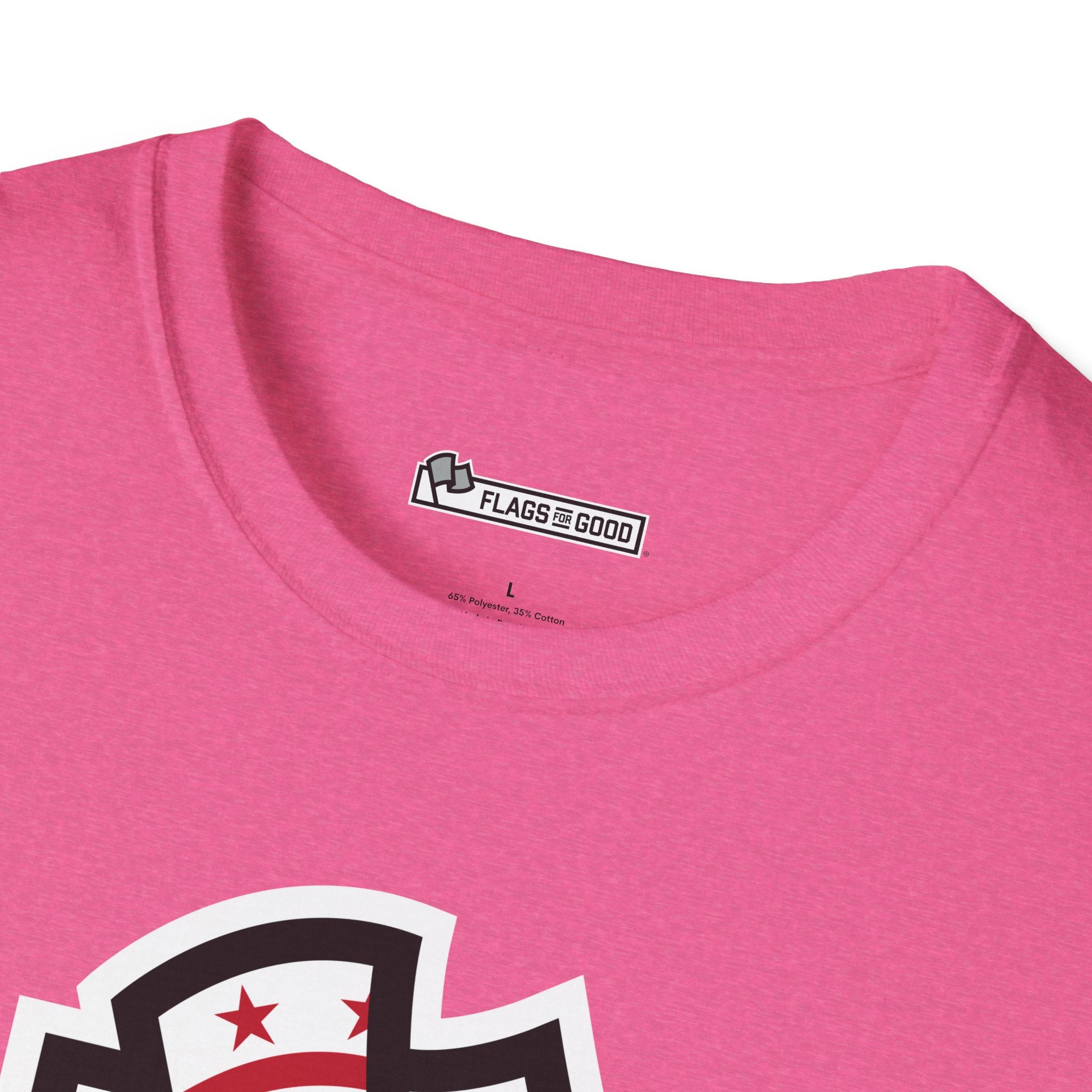 Flags For Good logo inside of an pink shirt