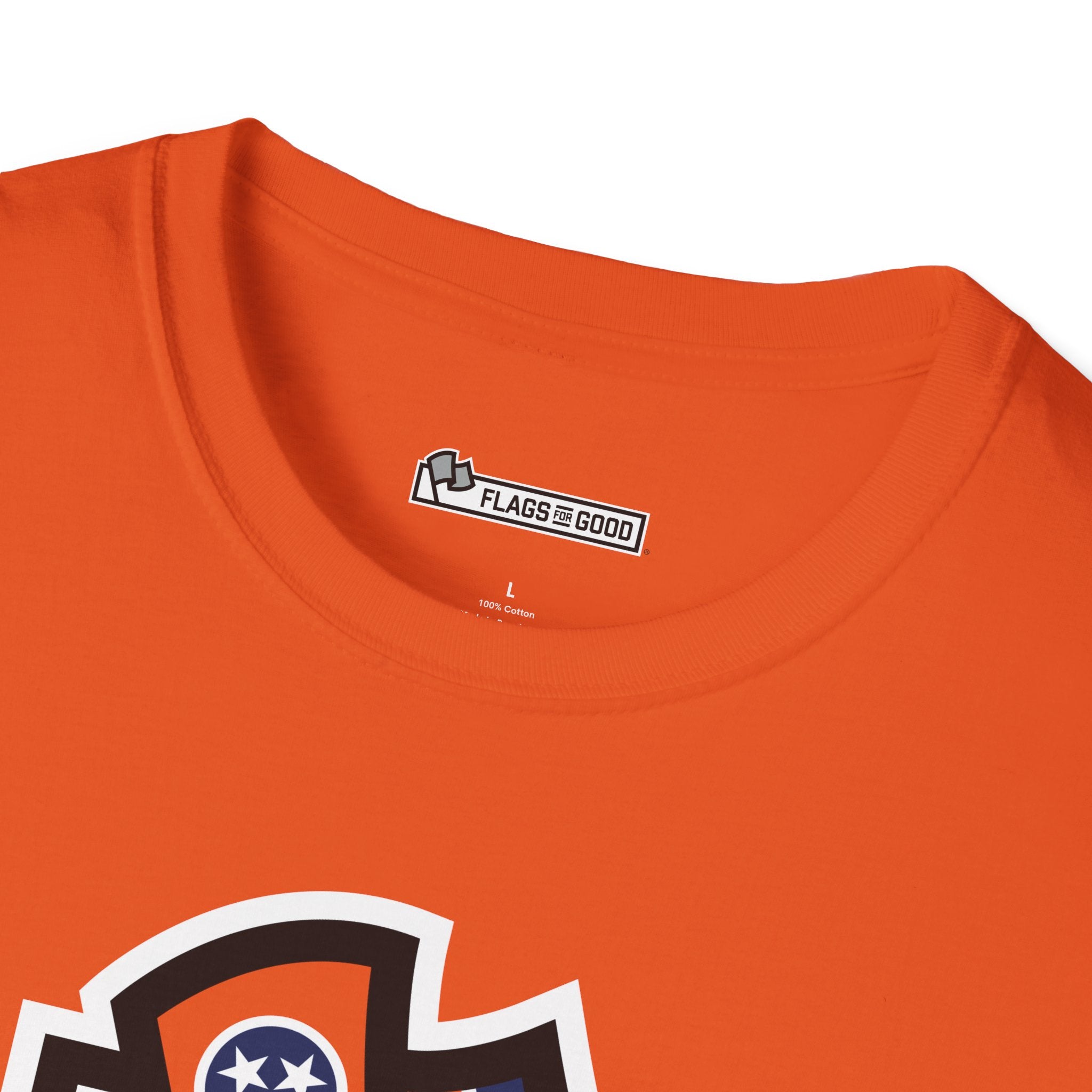Flags For Good logo inside of an orange shirt