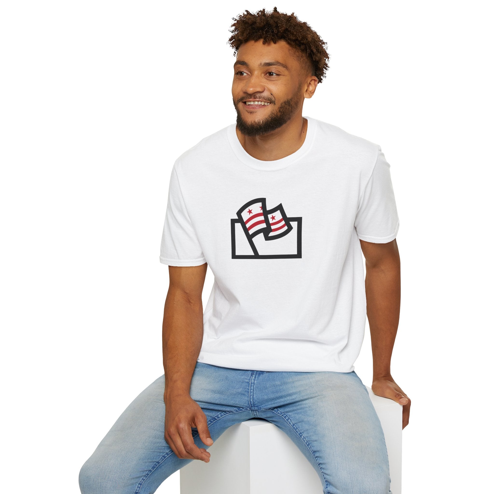 white shirt with Washington DC flag inside the Flags For Good logo being worn by a man sitting