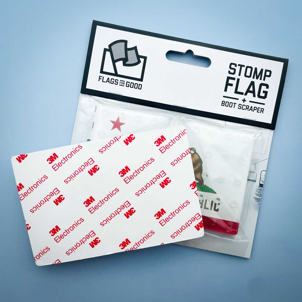California flag snowboard stomp pad by Flags For Good in packaging showing the 3M backing