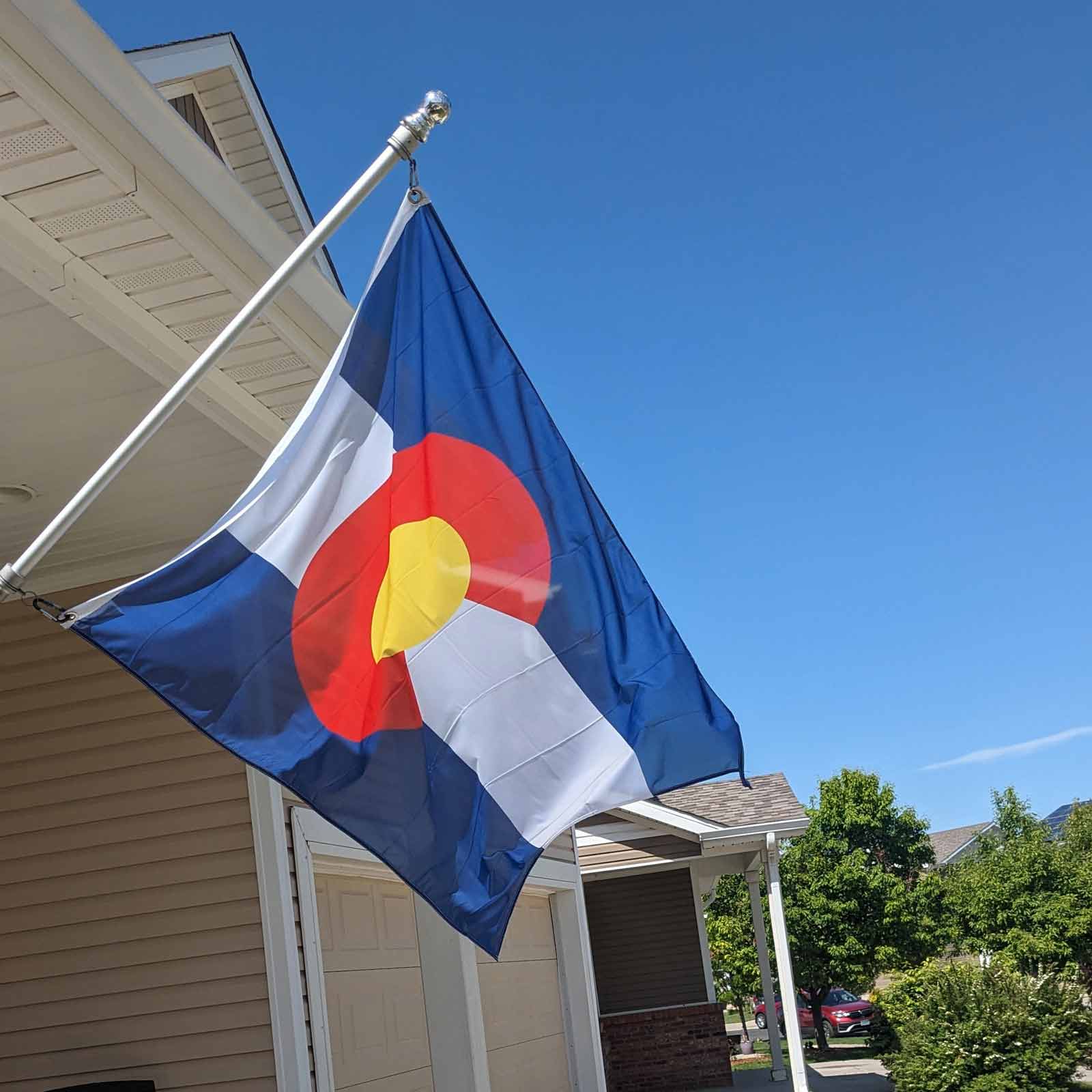 colorado state flag on a pole
