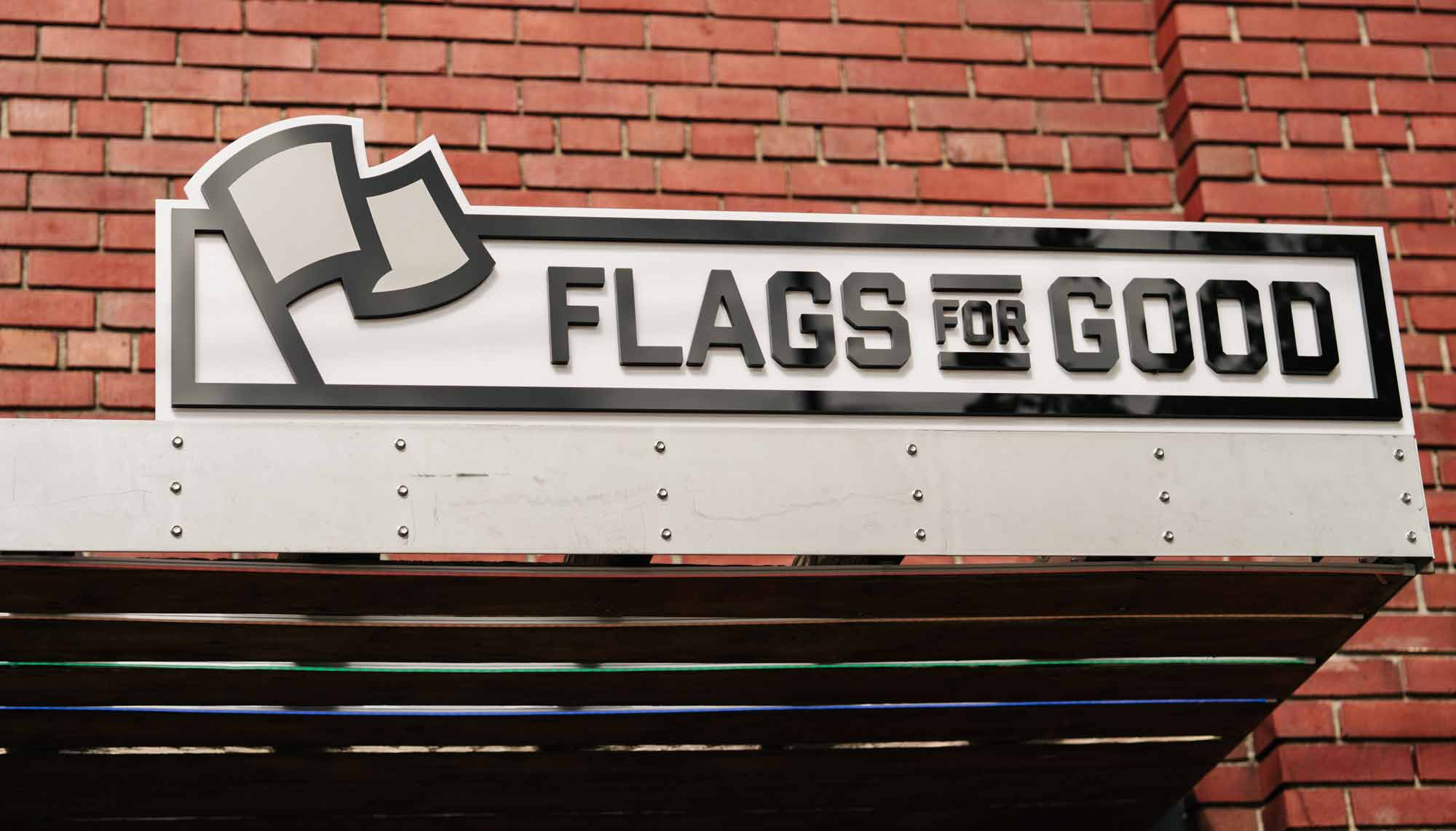 Flags For Good logo on the front awning of their Heaquarters