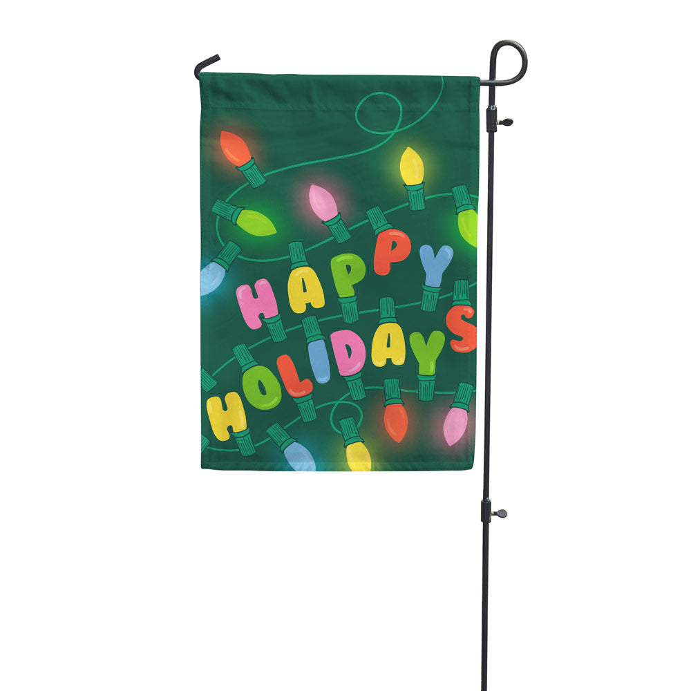 Happy Holidays garden flag written with holiday lights on a green background