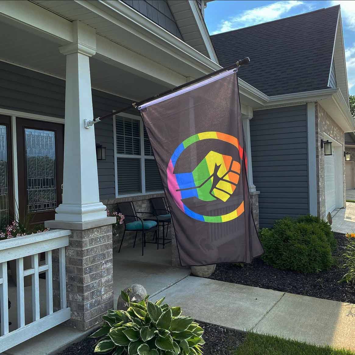 Black Lives Matter Pride Fist on a house