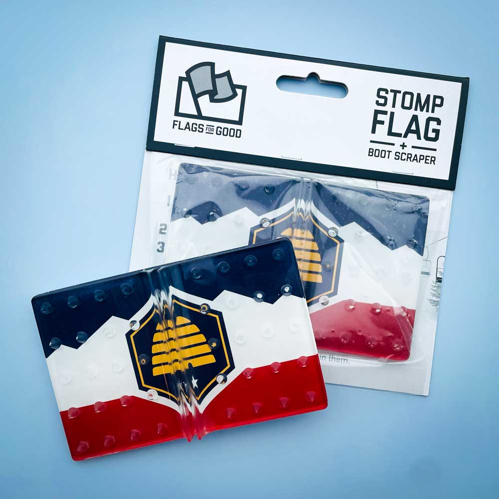 Utah flag snowboard stomp pad by Flags For Good in packaging.