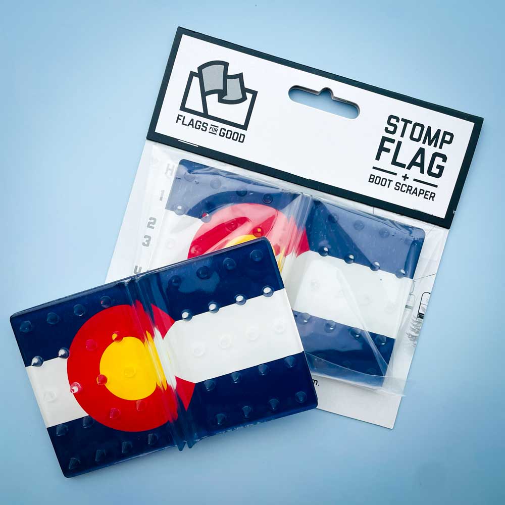 Colorado Flag Snowboard Stomp Pad by Flags For Good and its packaging