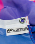 Bisexual pride Flag by Flags For Good showing the branded tag and grommet