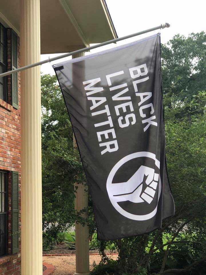 black lives matter and BLM fist flag