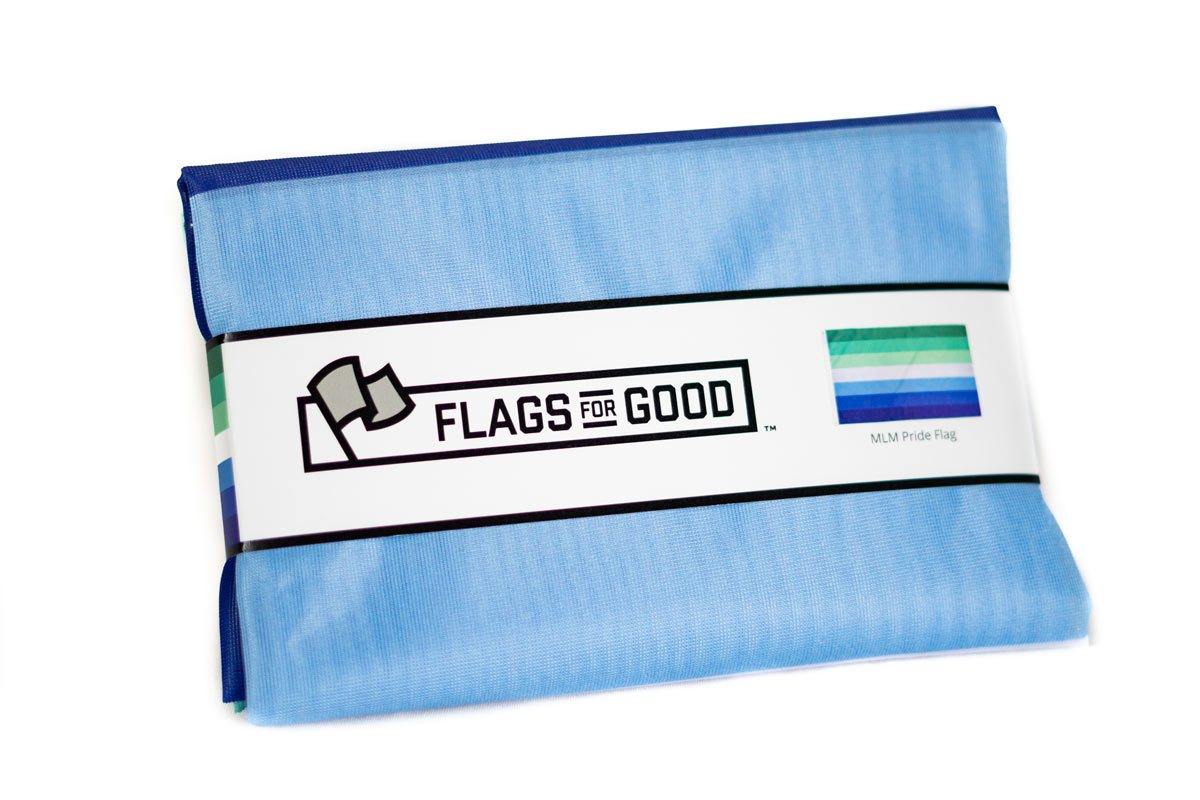 man loving man (MLM) gay pride flag folded in it's packaging