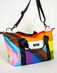 Upcycled Progress Pride Flag Weekender Bag with black strap - Flags For Good X PUP