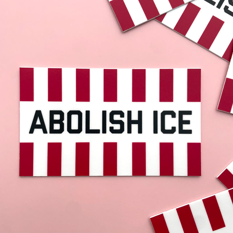 Striped sticker with 'ABOLISH ICE' text on a pink background