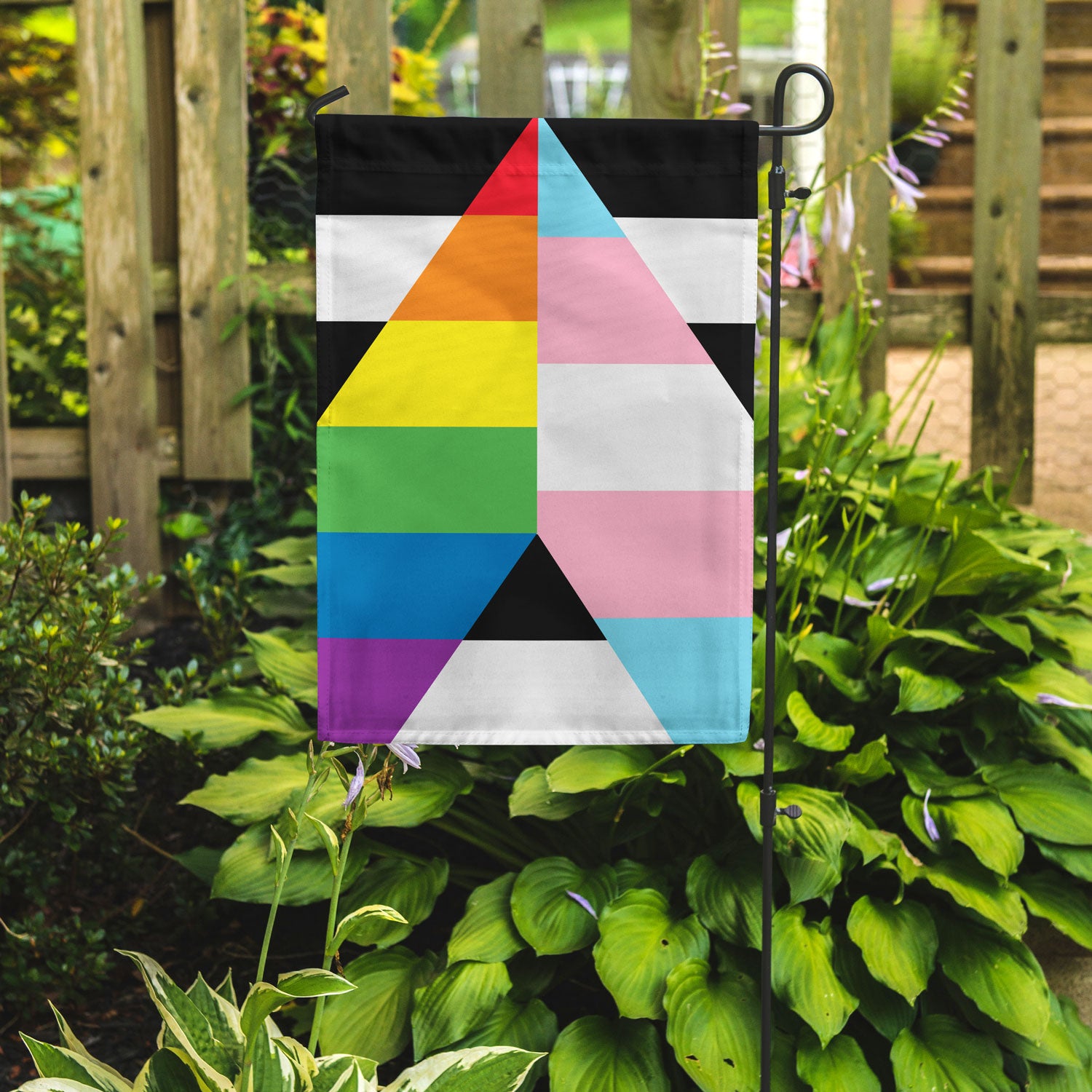 Flags for Good Ally Garden Flag with Trans Stripes in garden setting