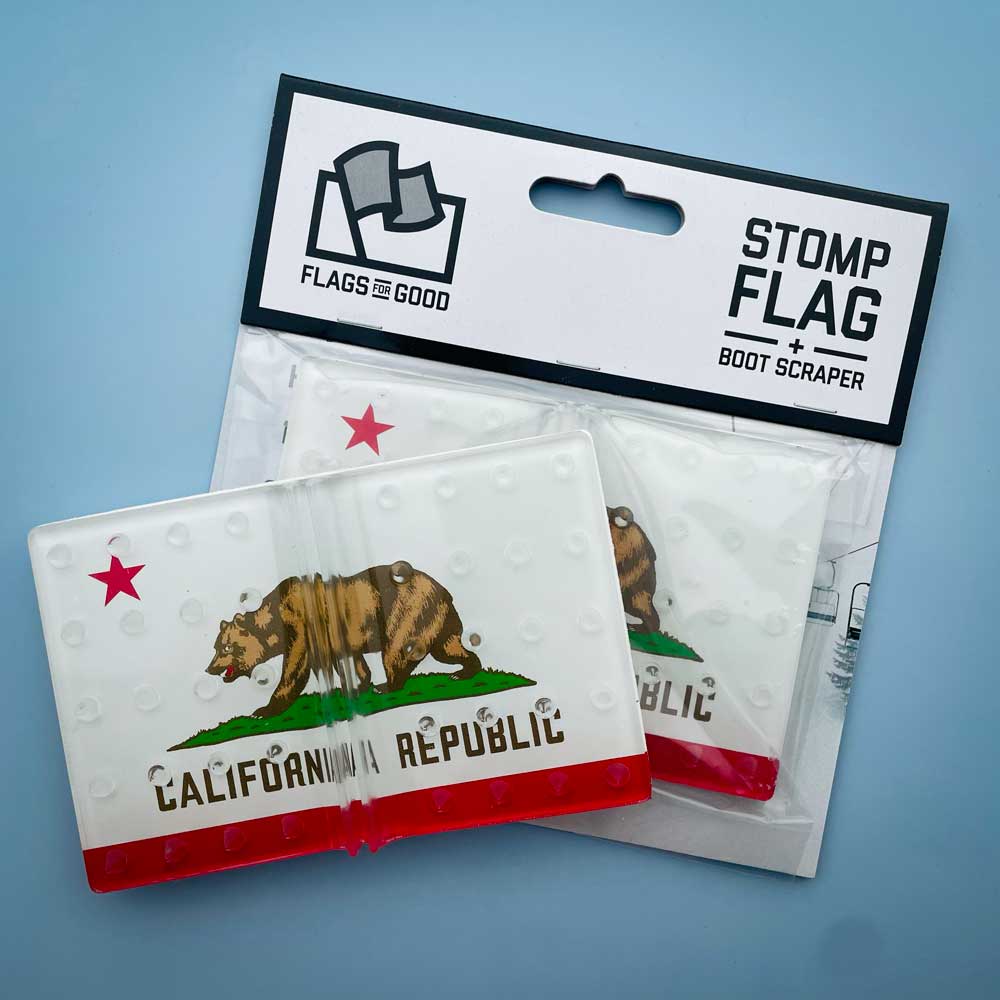 California flag snowboard stomp pad by Flags For Good in packaging.