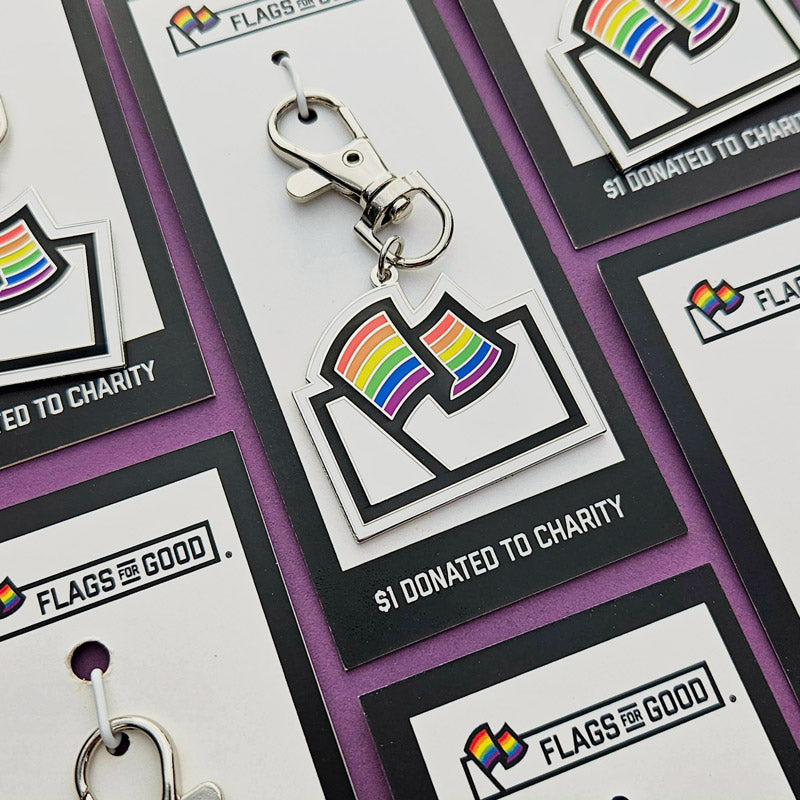 Keychain with a rainbow Flags for Good logo design on a card