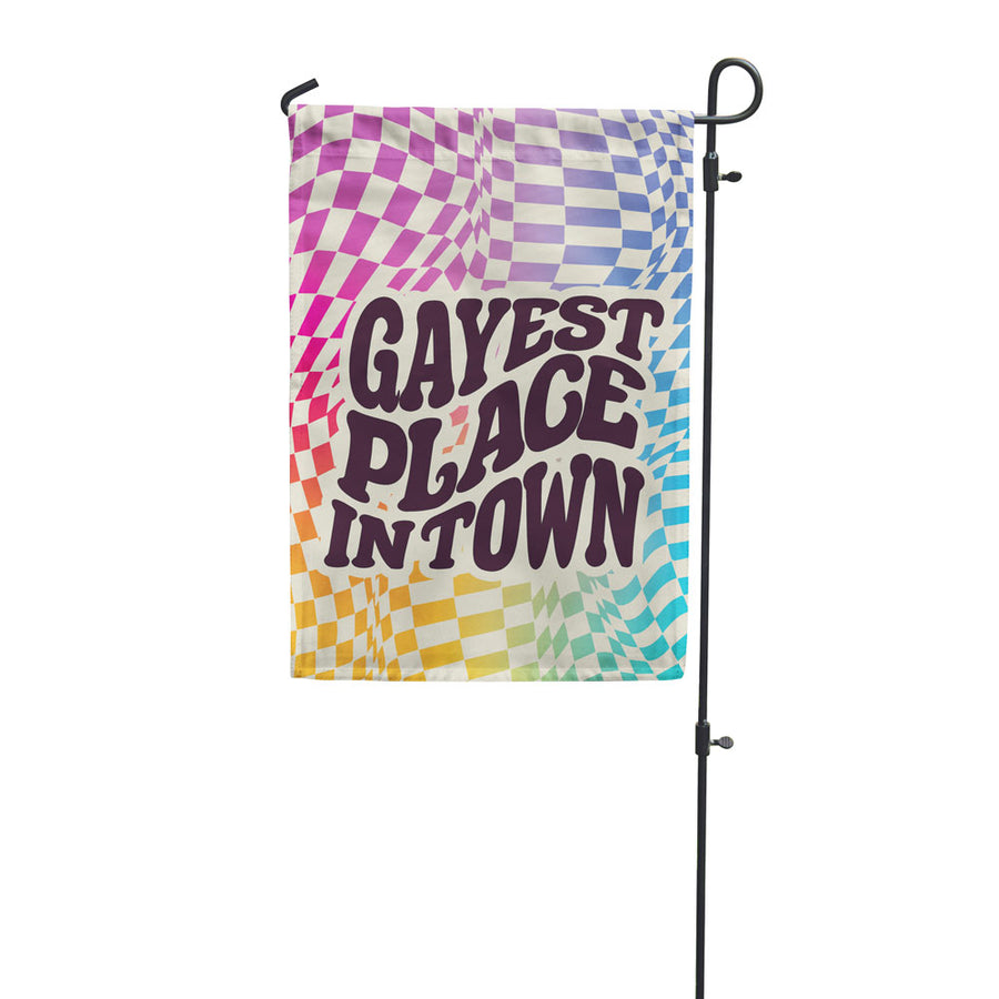 Gayest Place in Town garden flag, off black text on a wavy checkered background
