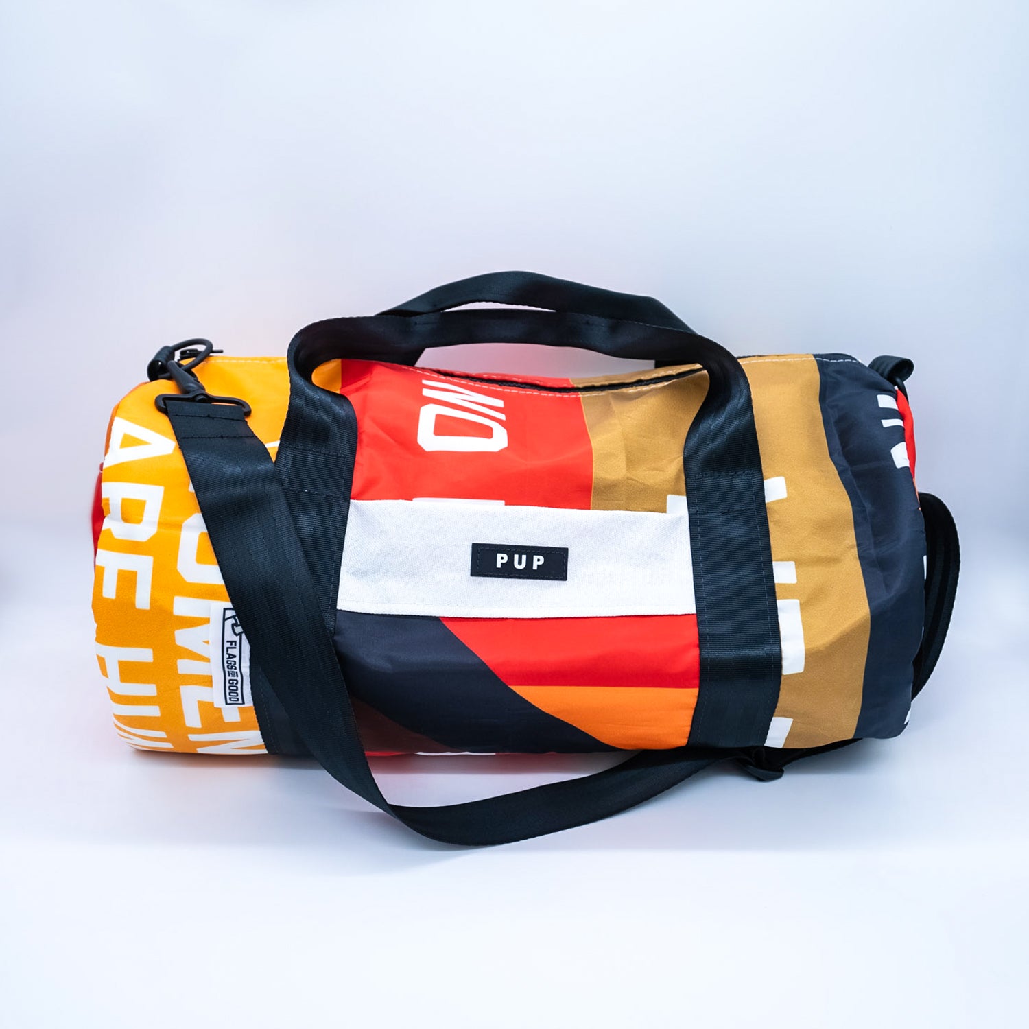 &quot;In This House&quot; Flag Duffel Bag