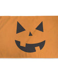 orange jack-o-lantern pumpkin flag with black cut outs for facial features. designed by flags for good