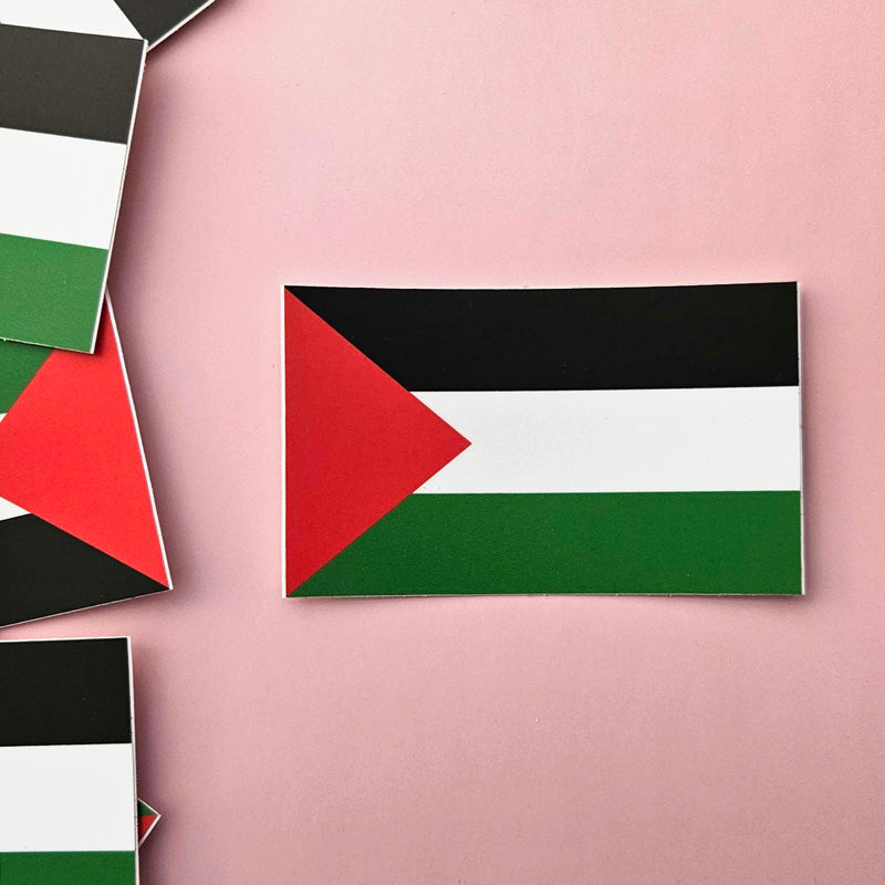 Palestine sticker on a light pink background