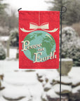 Peace on earth garden flag in winter settings