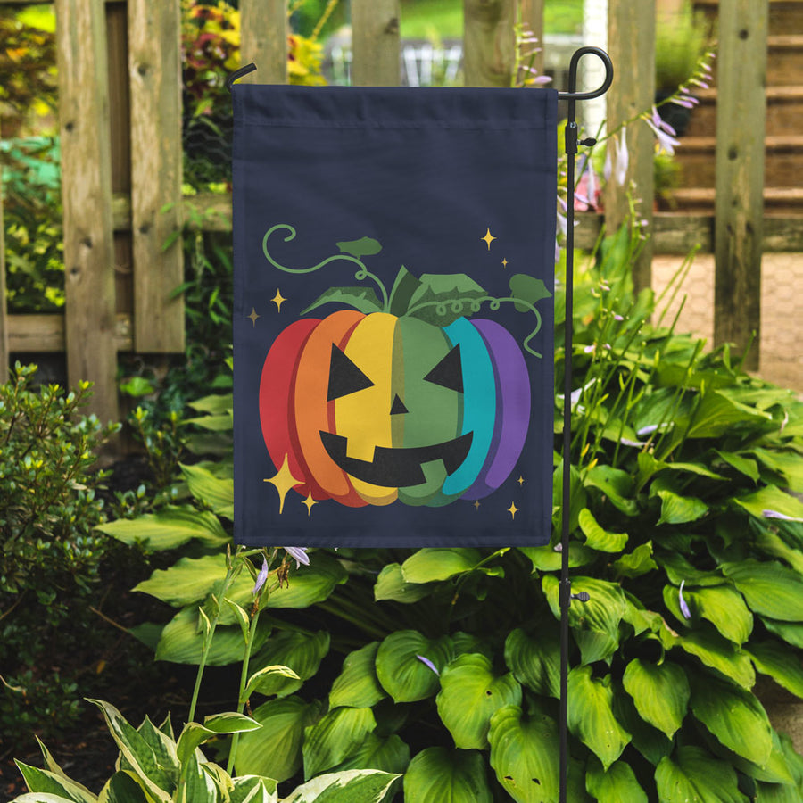 outdoor rainbow pumpkin garden flag in garden 