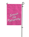 smash the patriarchy garden flag in hot pink with white lettering. designed by flags for good