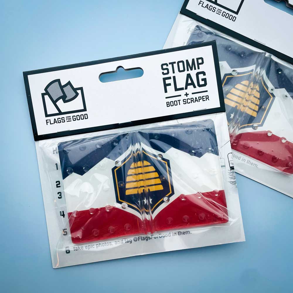 Utah flag snowboard stomp pad by Flags For Good in packaging.