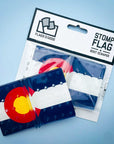 Colorado Flag Snowboard Stomp Pad by Flags For Good and its packaging