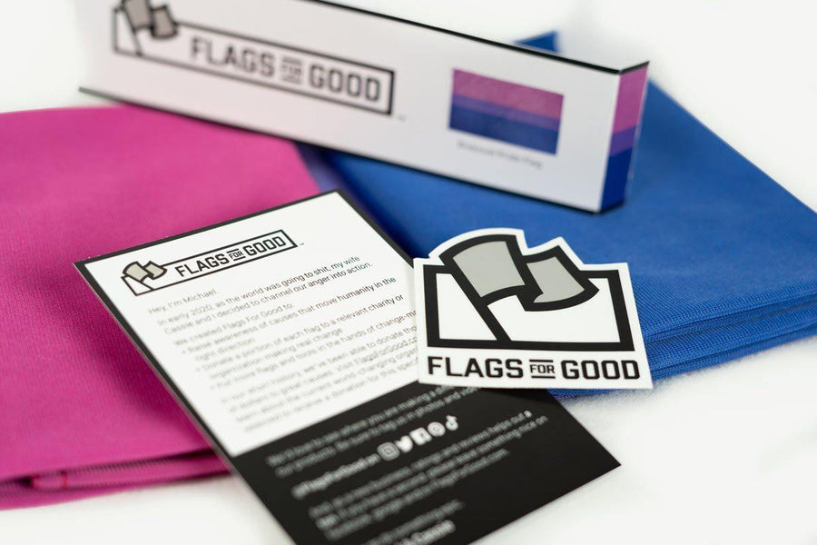 Bisexual pride flag by Flags For Good unfolded showing the insert and sticker