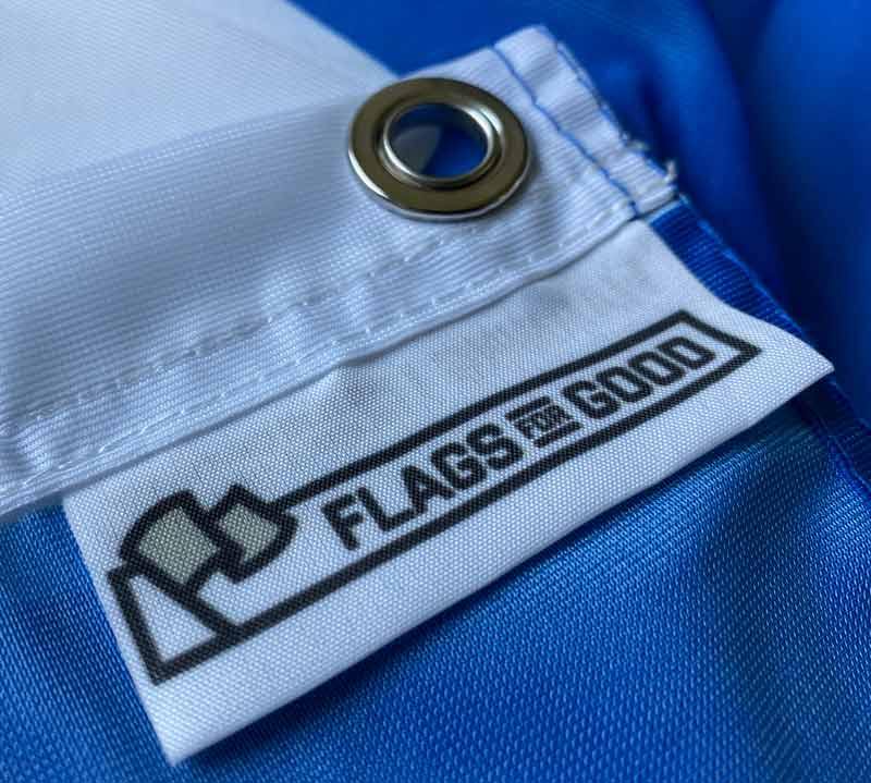 A close up of a Flags For Good product tag.