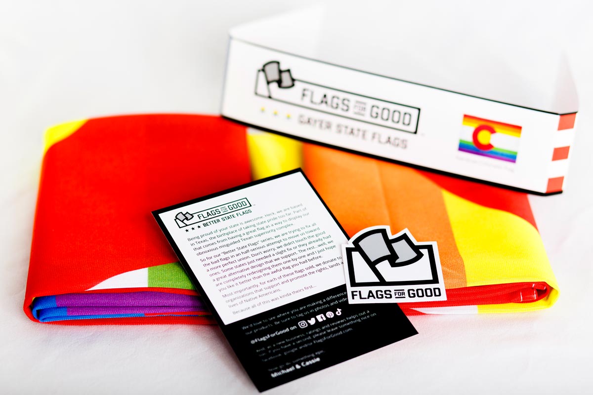 rainbow colorado state flag unfolded and showing the insert card and sticker