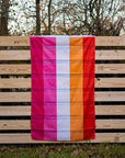 our Lesbian flag hanging on a fence