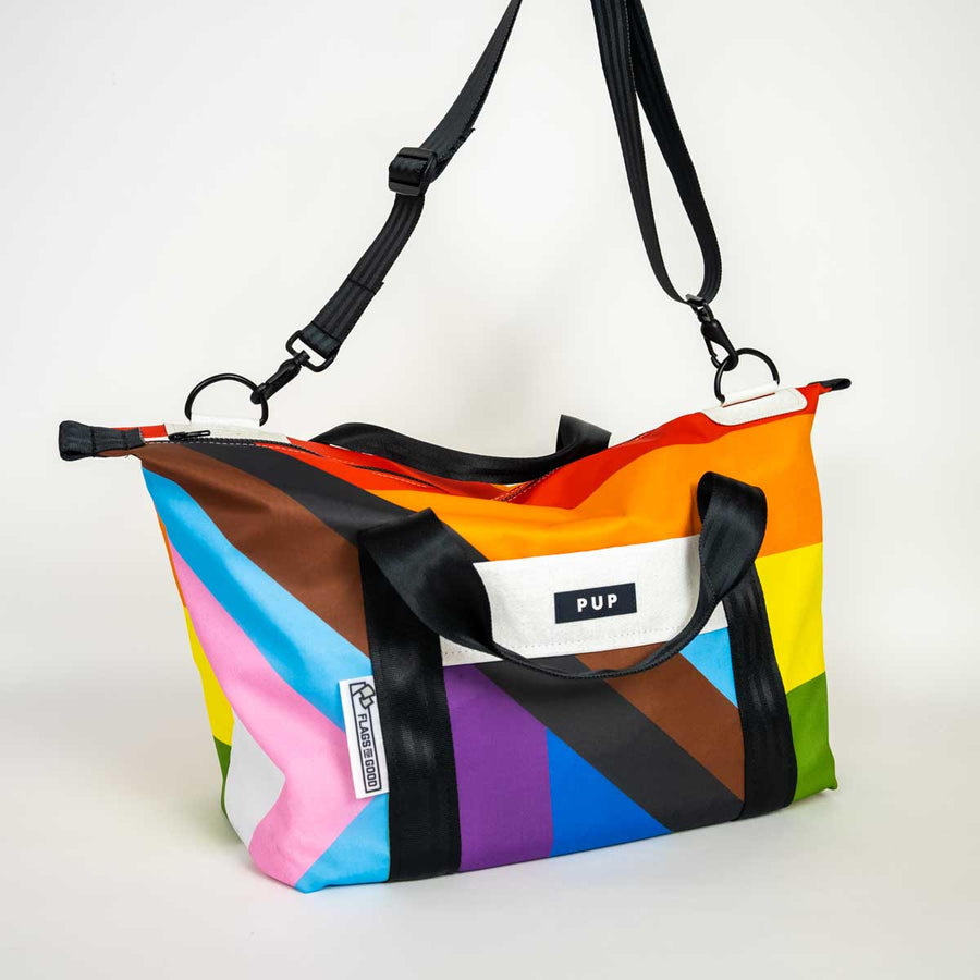 Upcycled Progress Pride Flag Weekender Bag with black strap - Flags For Good X PUP