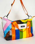 Upcycled Progress Pride Flag Weekender Bag with orange strap - Flags For Good X PUP