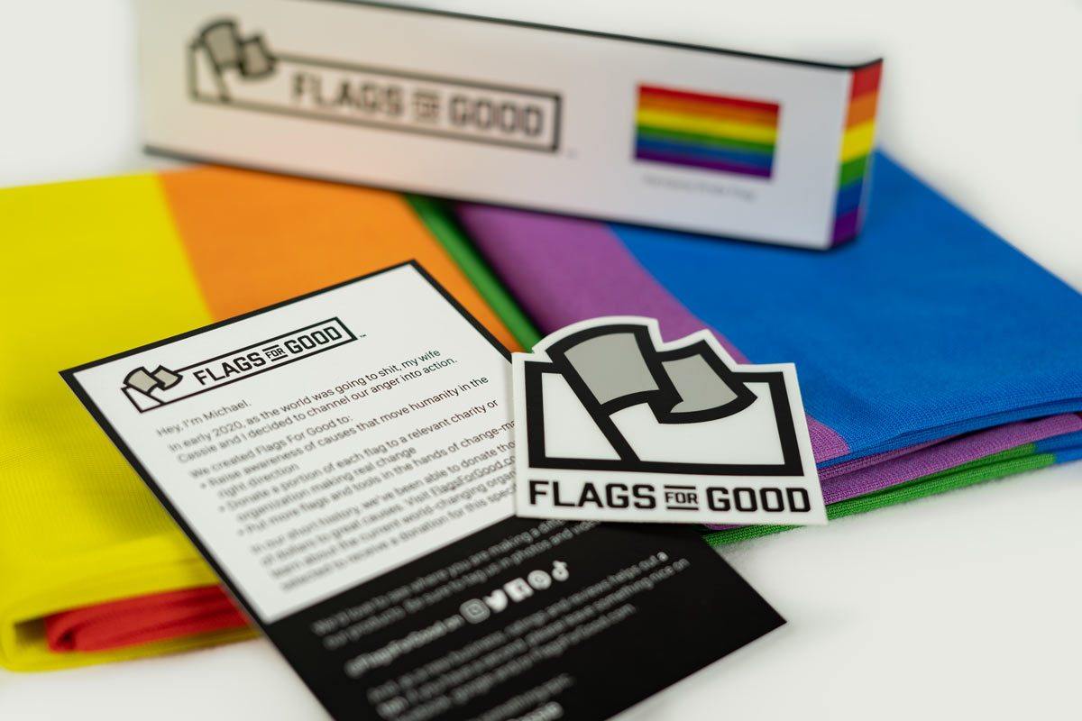 rainbow pride flag unfolded showing insert card and sticker