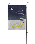seasons greetings garden flag with dog peeing in snow on a beautiful winter night