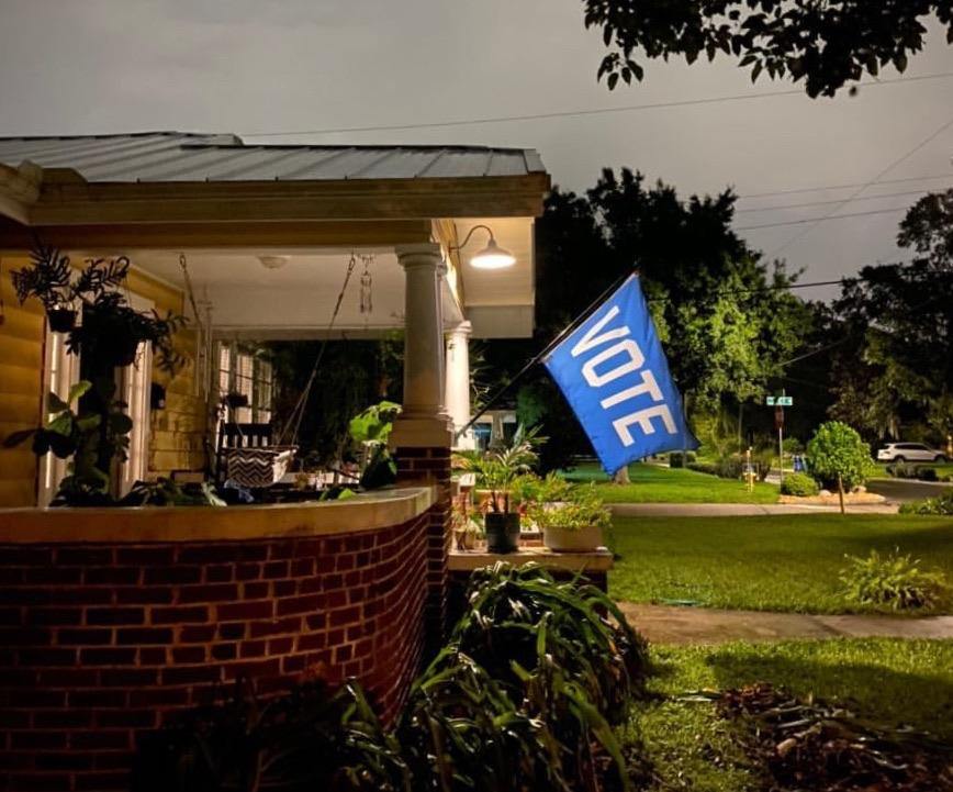 Vote Flag flow in front of a house